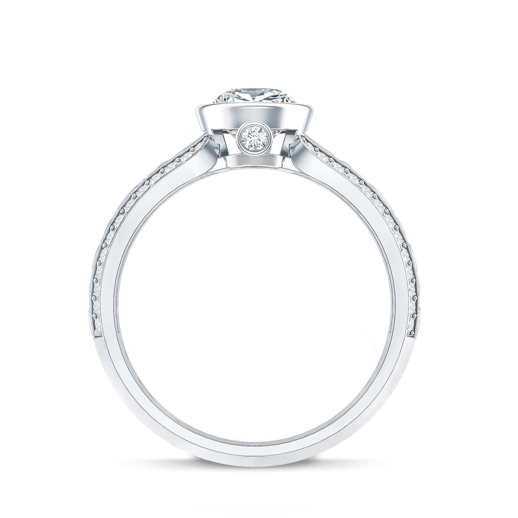 A silver engagement ring with a diamond center stone.