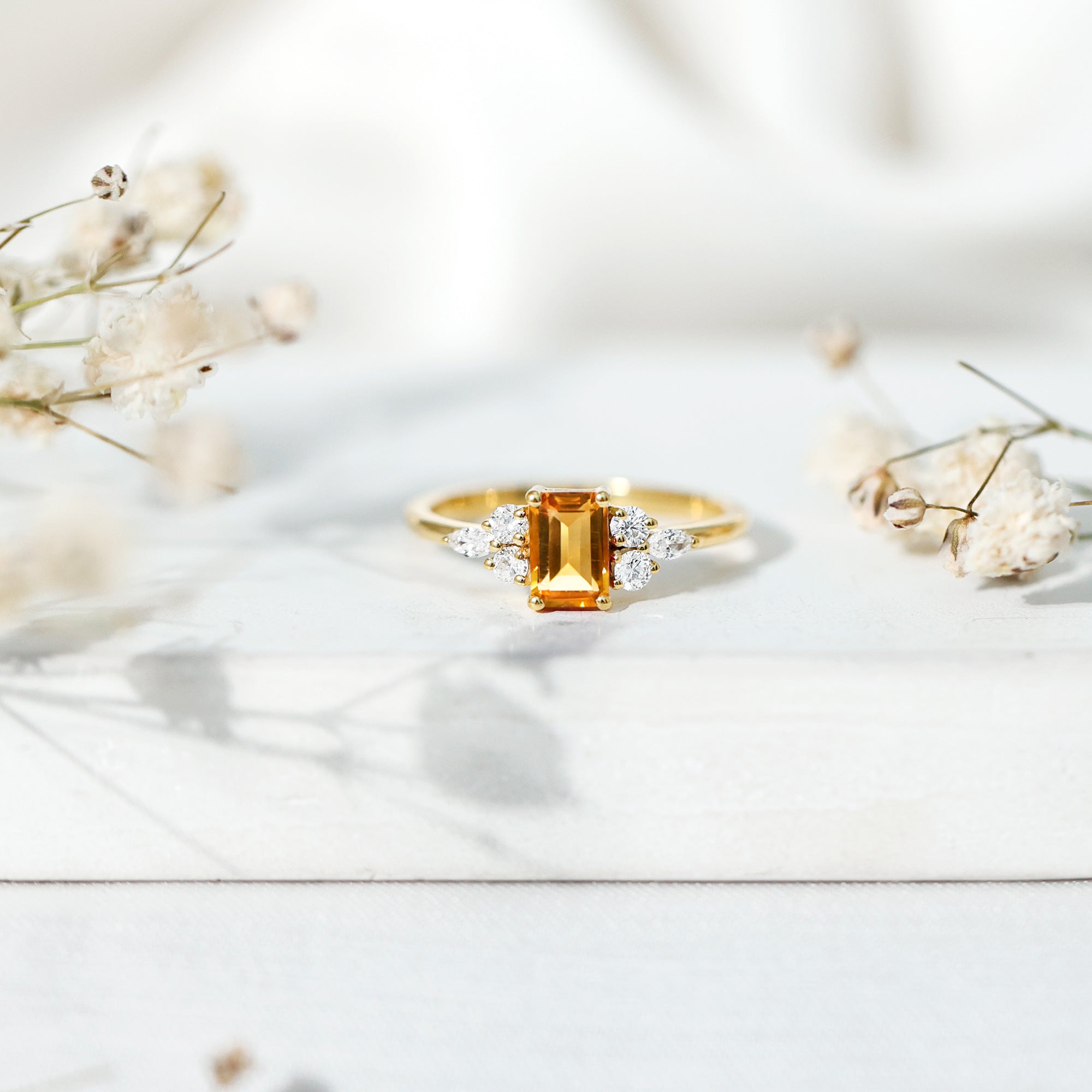 Citrine Engagement Ring – Emerald Cut 0.6 Ct with Diamond Trio in Yellow Gold