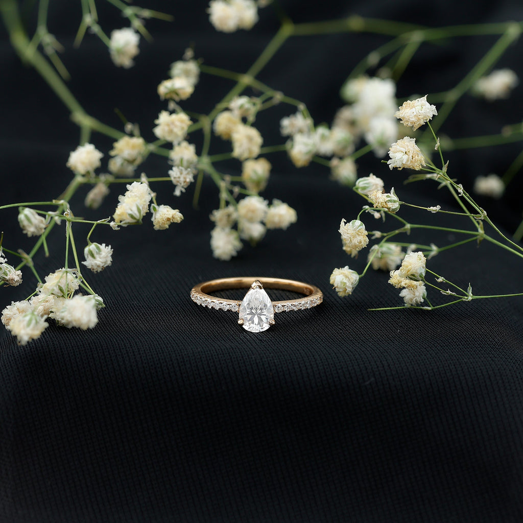 0.6 Carat Pear Cut Man Made Diamond Engagement Ring