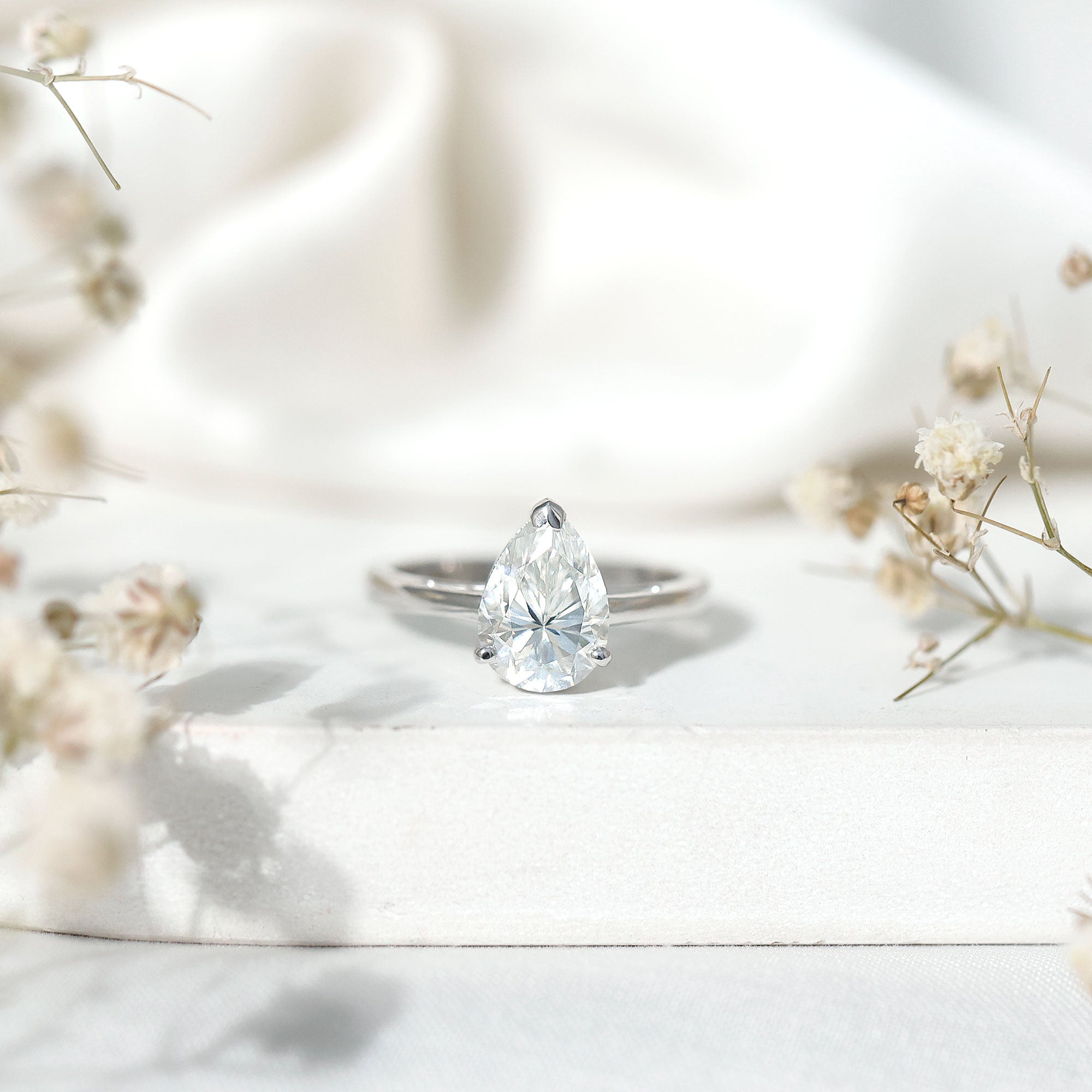 Moissanite Engagement Ring – 2 Carat Pear Shaped Solitaire With D Color Clarity