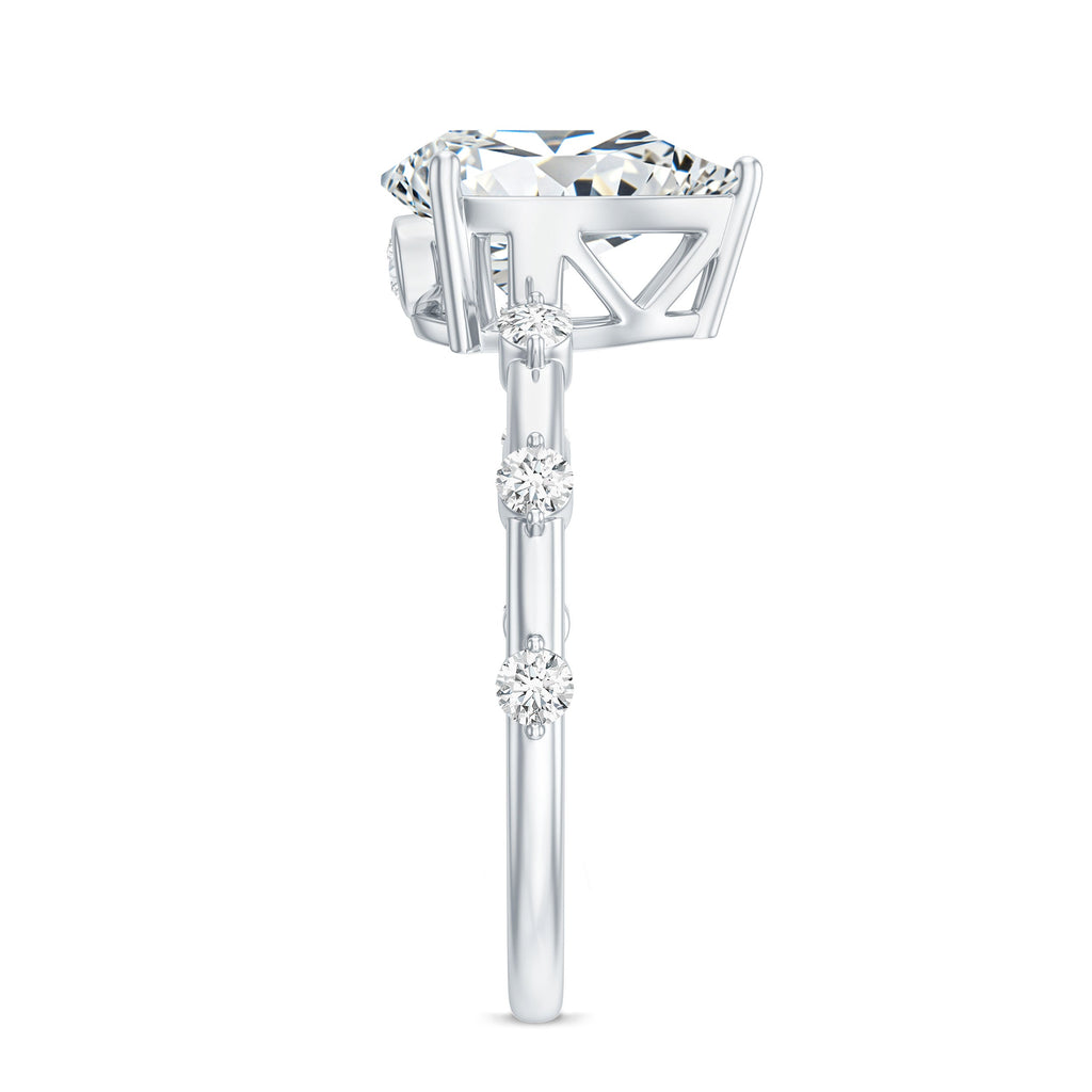 Pear Shaped Moissanite Engagement Ring with Spaced Accent