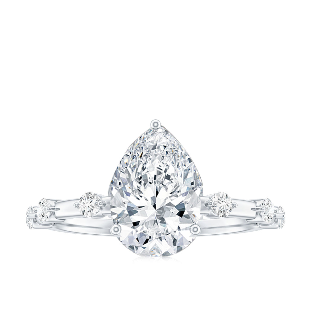 Pear Shaped Moissanite Engagement Ring with Spaced Accent