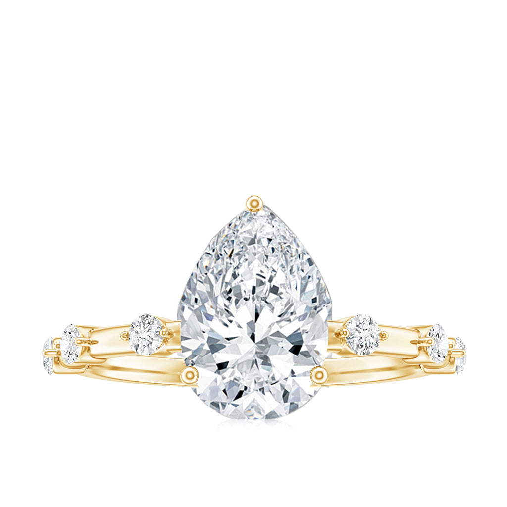 Pear Shaped Moissanite Engagement Ring with Spaced Accent
