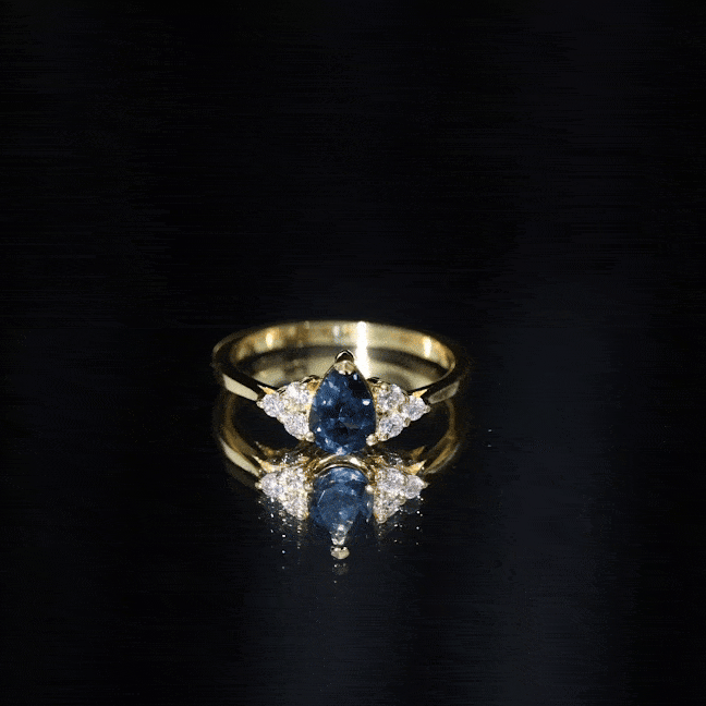5X7mm Pear Shape London Blue Topaz Engagement Ring with Diamond Trio