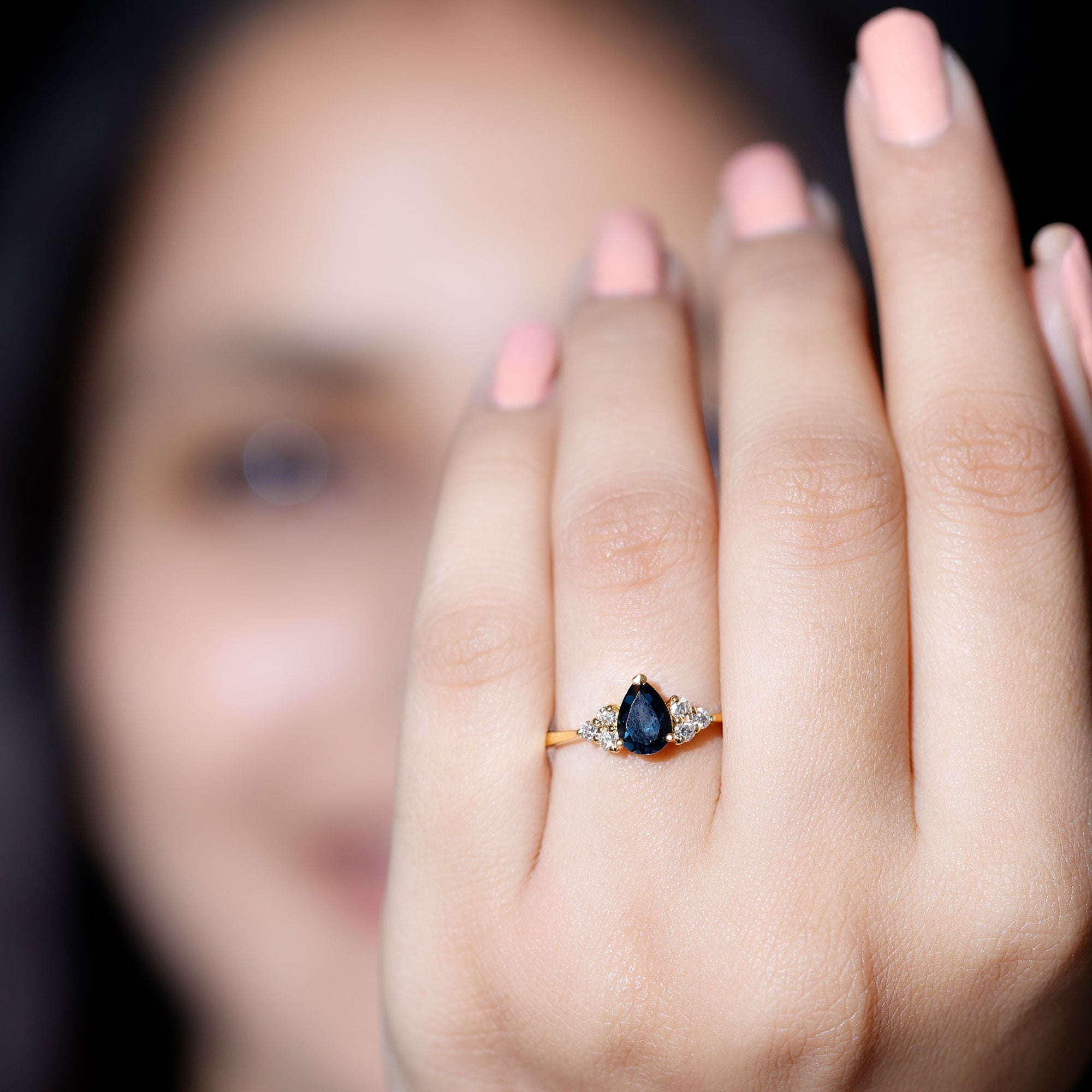 5X7mm Pear Shape London Blue Topaz Engagement Ring with Diamond Trio