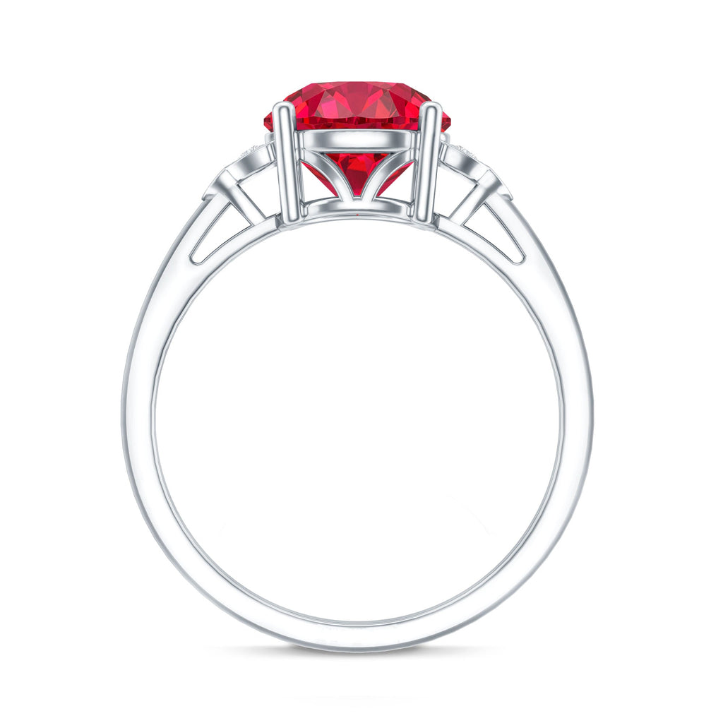 Lab grown ruby solitaire engagement ring with diamond trio side accents in silver setting