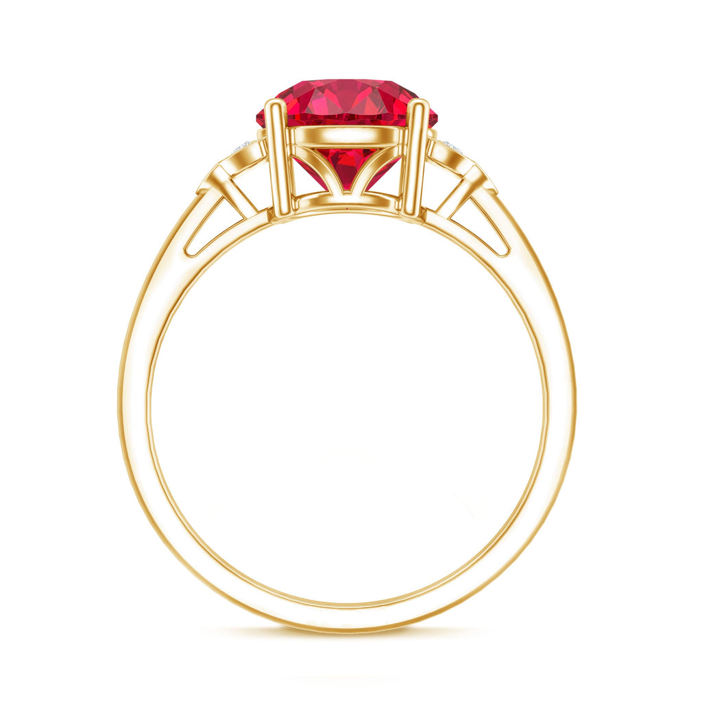 Lab grown ruby solitaire engagement ring with diamond trio in yellow gold
