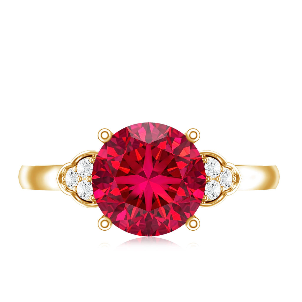 Lab grown ruby solitaire engagement ring with diamond trio on gold band