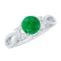 Emerald Engagement Ring – Designer Crossover Shank with Hidden Diamond Flower Accent