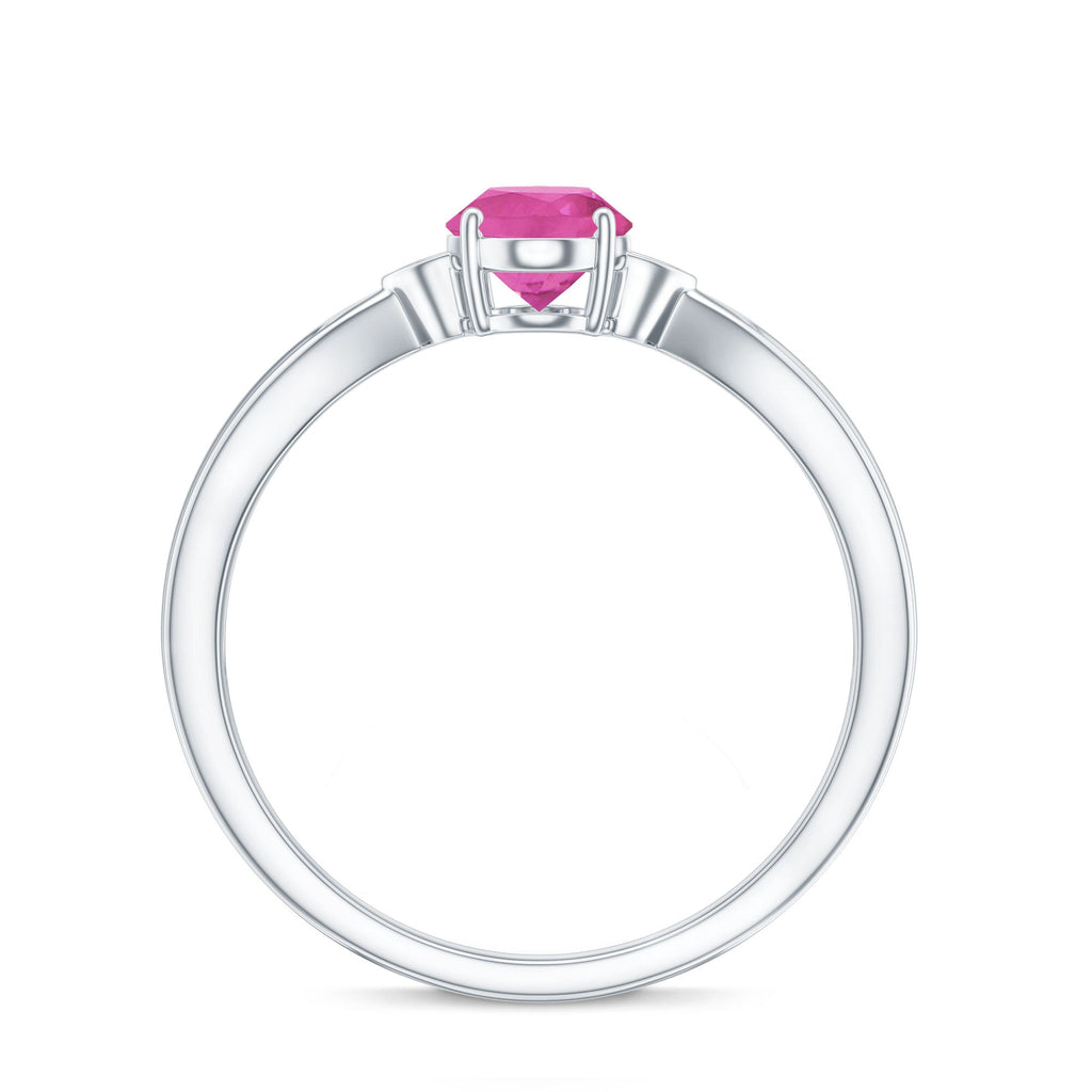 Oval shape pink tourmaline solitaire ring with diamond in white gold setting