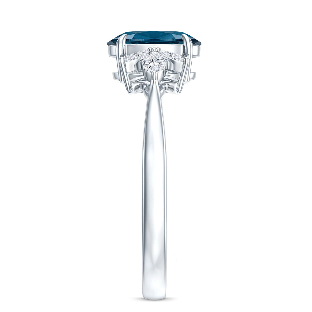 Oval Cut London Blue Topaz Engagement Ring with Diamond Trio