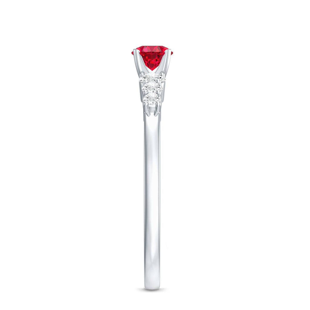 Side view of graduated style lab created ruby and diamond promise ring in white metal