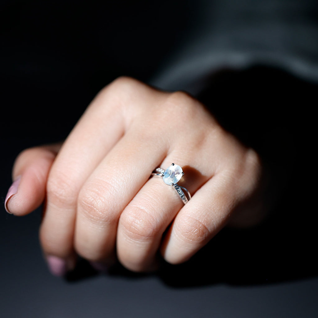 Oval Moonstone Infinity Engagement Ring with Diamond