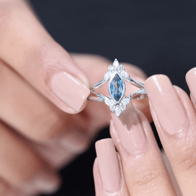 0.7 Carat Marquise Cut London Blue Topaz Cocktail Ring with Diamond