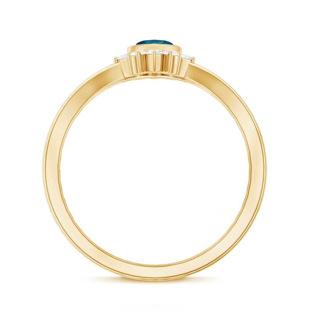 0.7 Carat Marquise Cut London Blue Topaz Cocktail Ring with Diamond