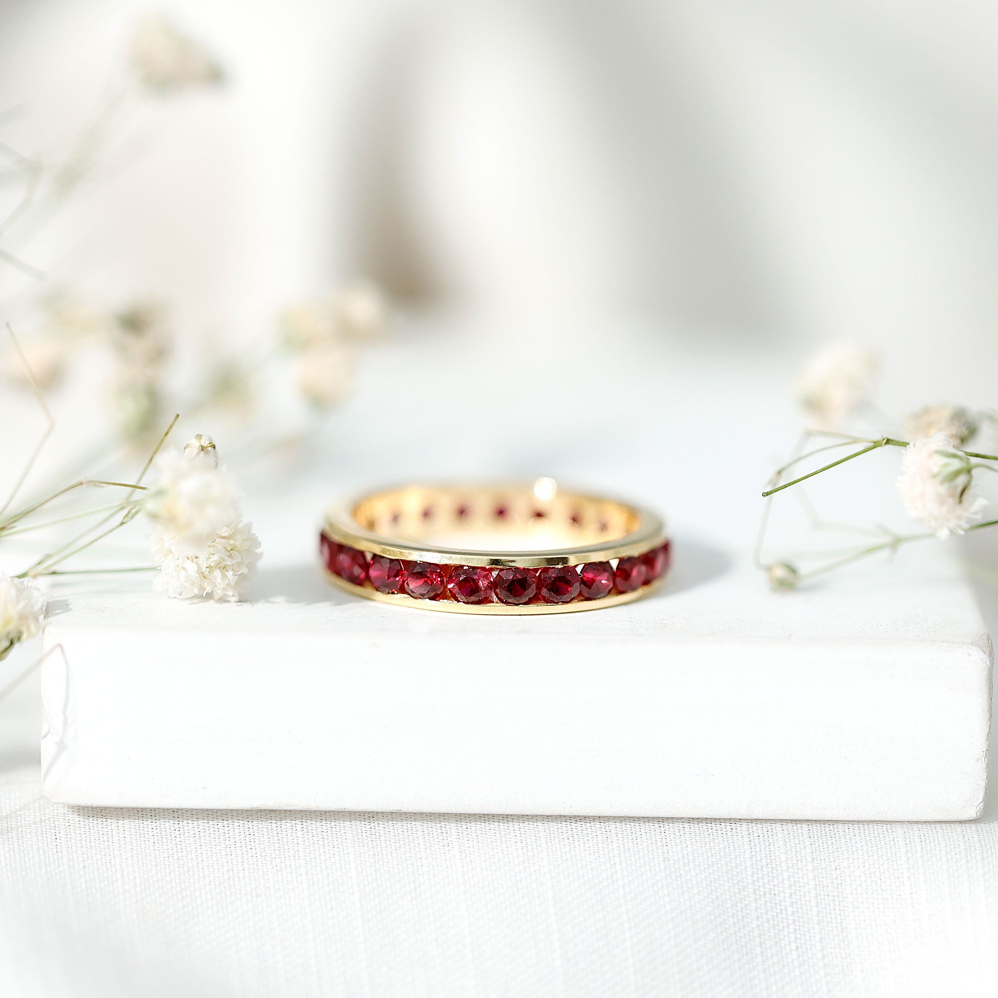 Created Ruby Eternity Ring – Full Channel Setting Band with Round Cut Stones