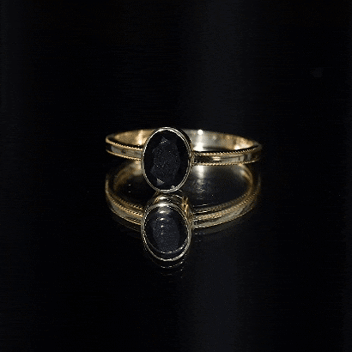 Simple Oval Cut Black Onyx Solitaire Ring in Bezel Setting