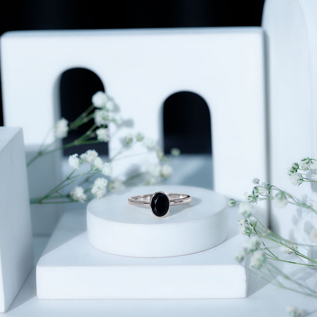 Simple Oval Cut Black Onyx Solitaire Ring in Bezel Setting