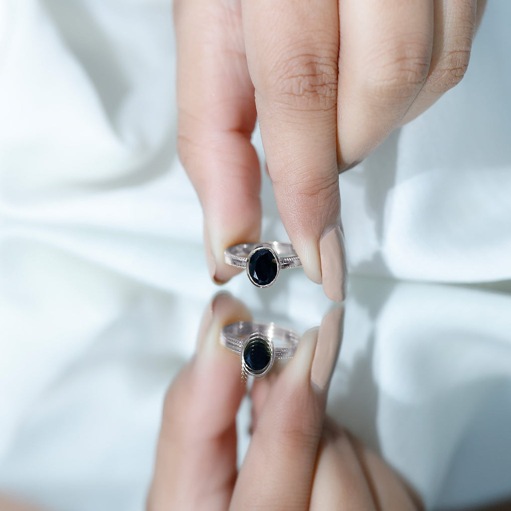Simple Oval Cut Black Onyx Solitaire Ring in Bezel Setting