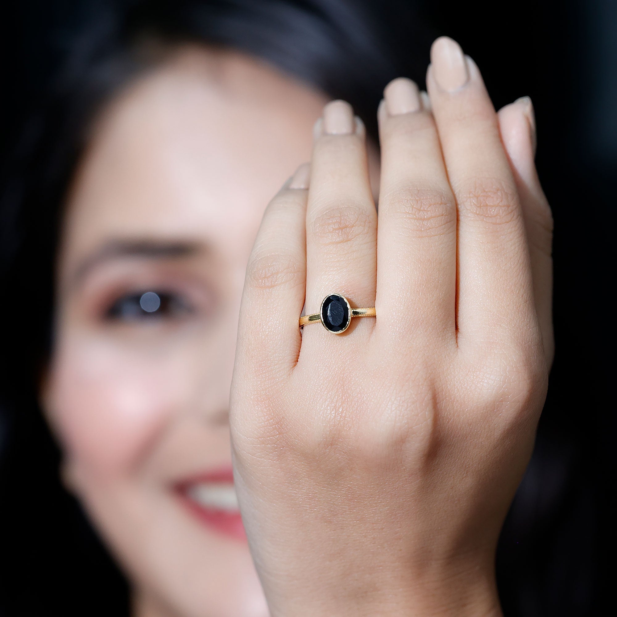 Simple Oval Cut Black Onyx Solitaire Ring in Bezel Setting