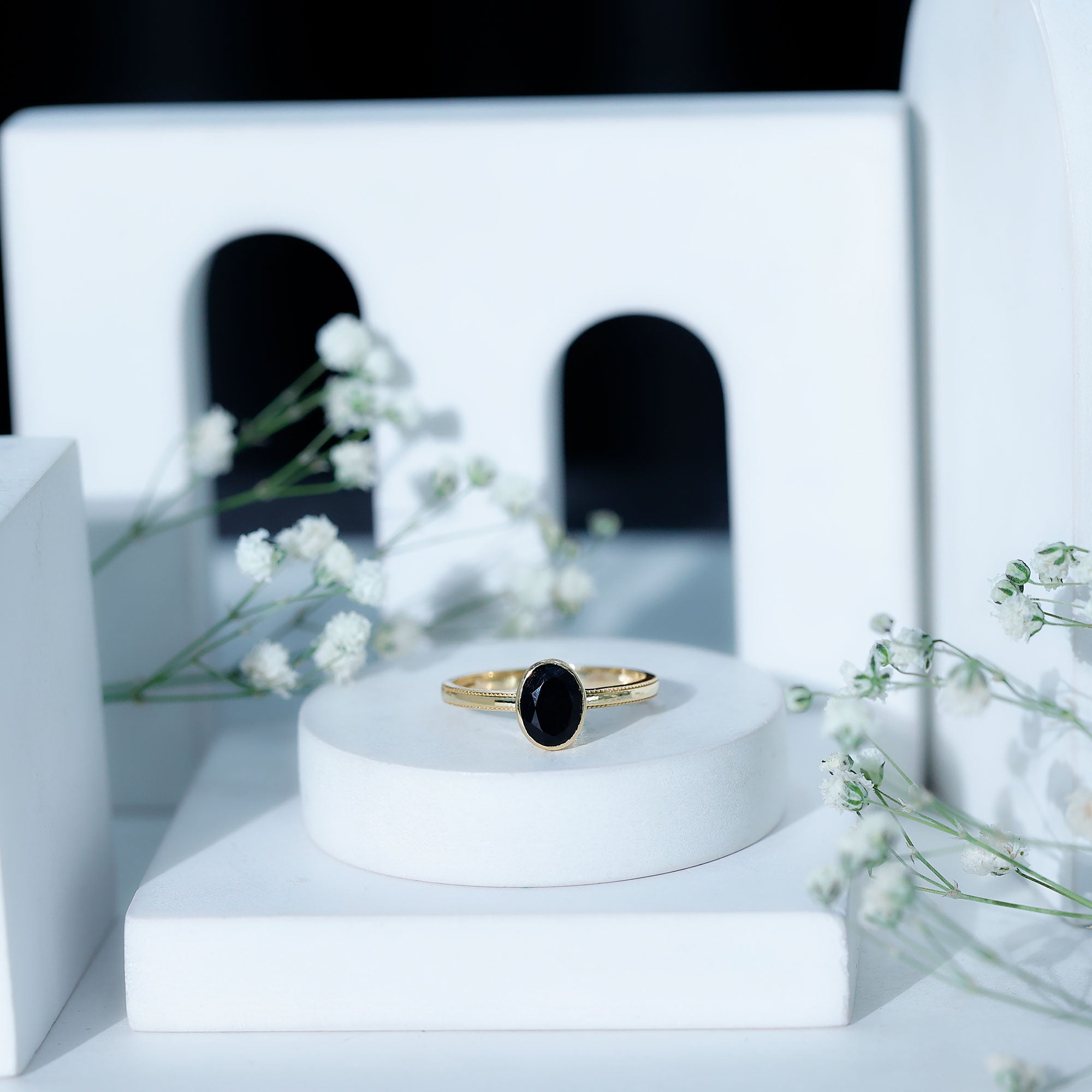 Simple Oval Cut Black Onyx Solitaire Ring in Bezel Setting
