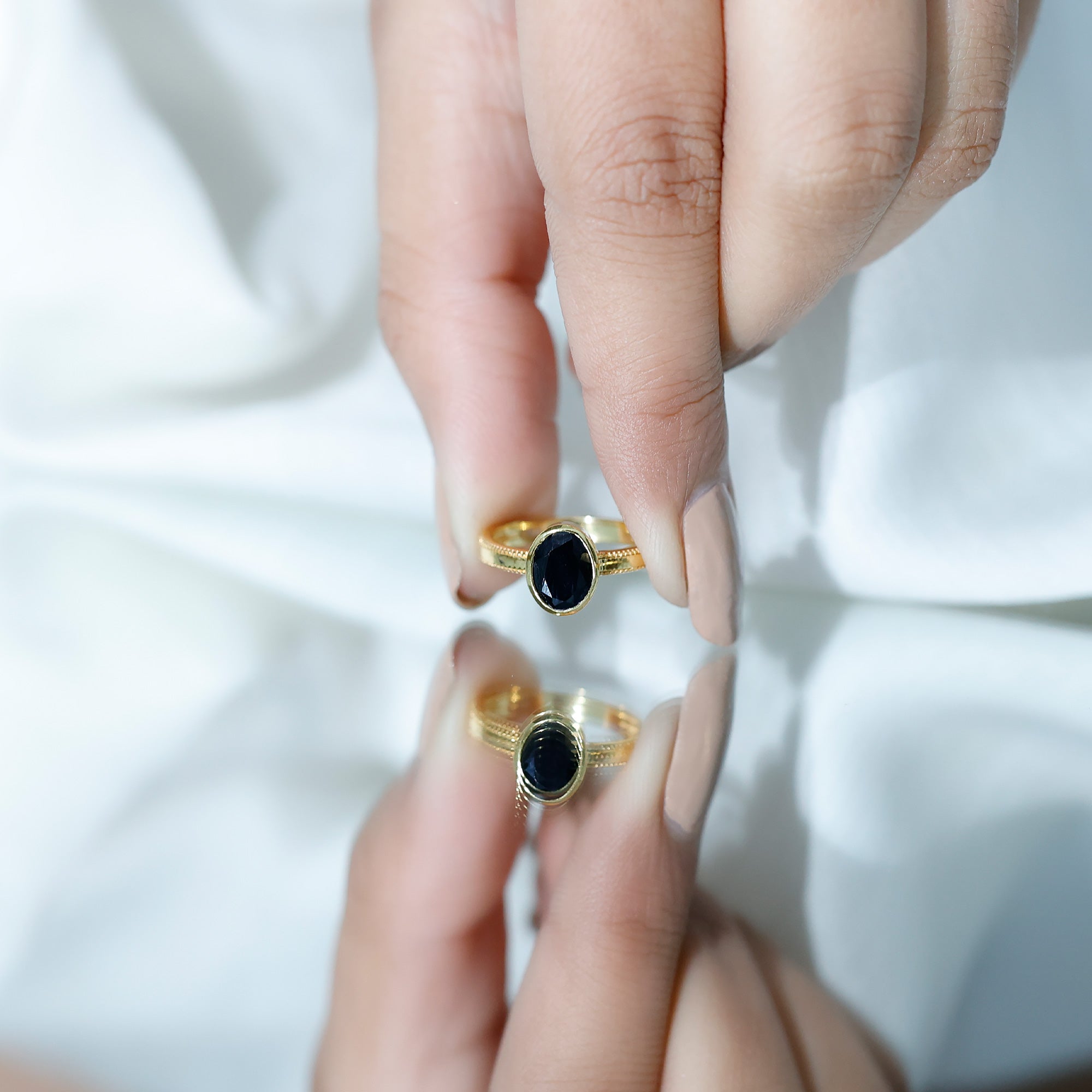 Simple Oval Cut Black Onyx Solitaire Ring in Bezel Setting