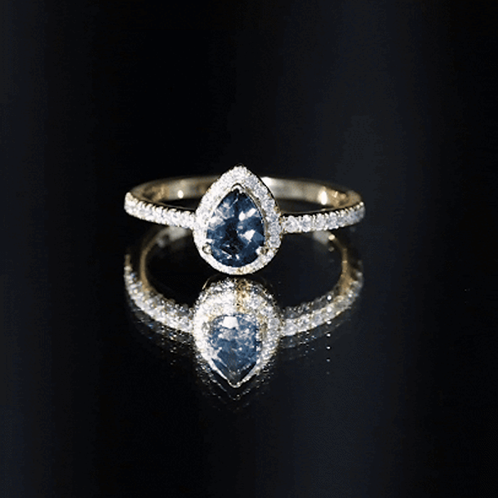 0.7 Carat Pear Shape London Blue Topaz Teardrop Engagement Ring with Moissanite Halo