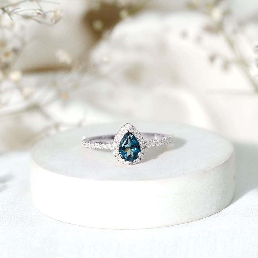 0.7 Carat Pear Shape London Blue Topaz Teardrop Engagement Ring with Moissanite Halo