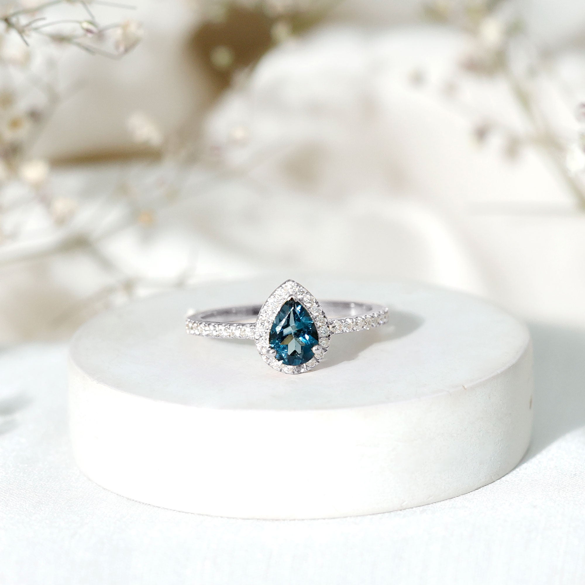 0.7 Carat Pear Shape London Blue Topaz Teardrop Engagement Ring with Moissanite Halo