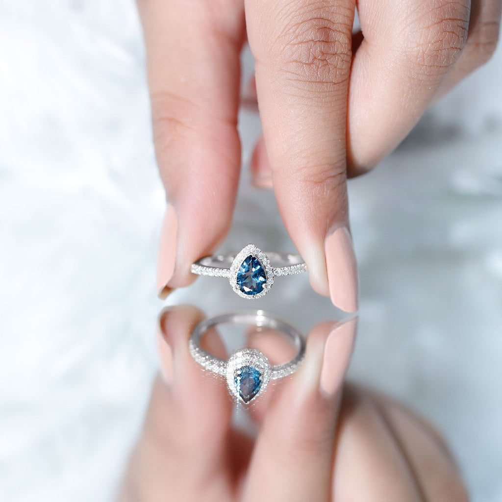 0.7 Carat Pear Shape London Blue Topaz Teardrop Engagement Ring with Moissanite Halo