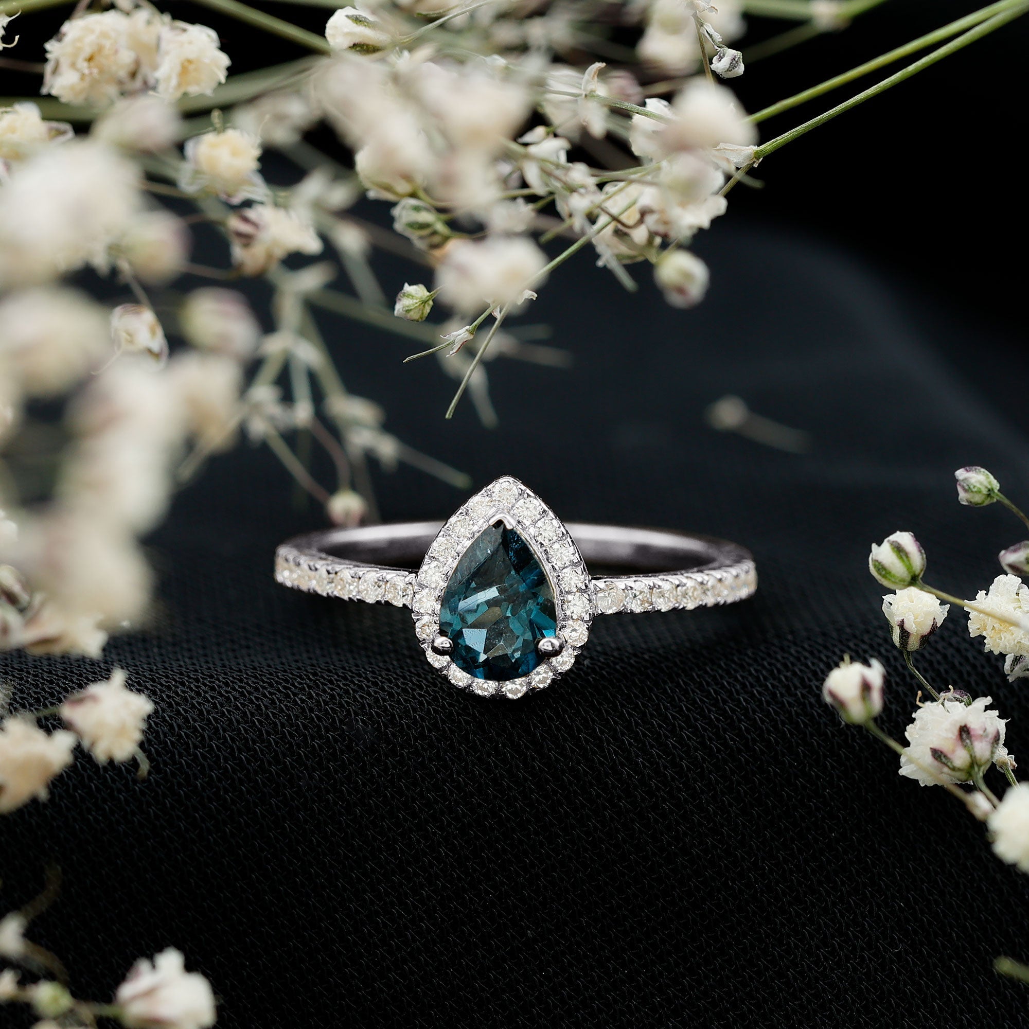 0.7 Carat Pear Shape London Blue Topaz Teardrop Engagement Ring with Moissanite Halo