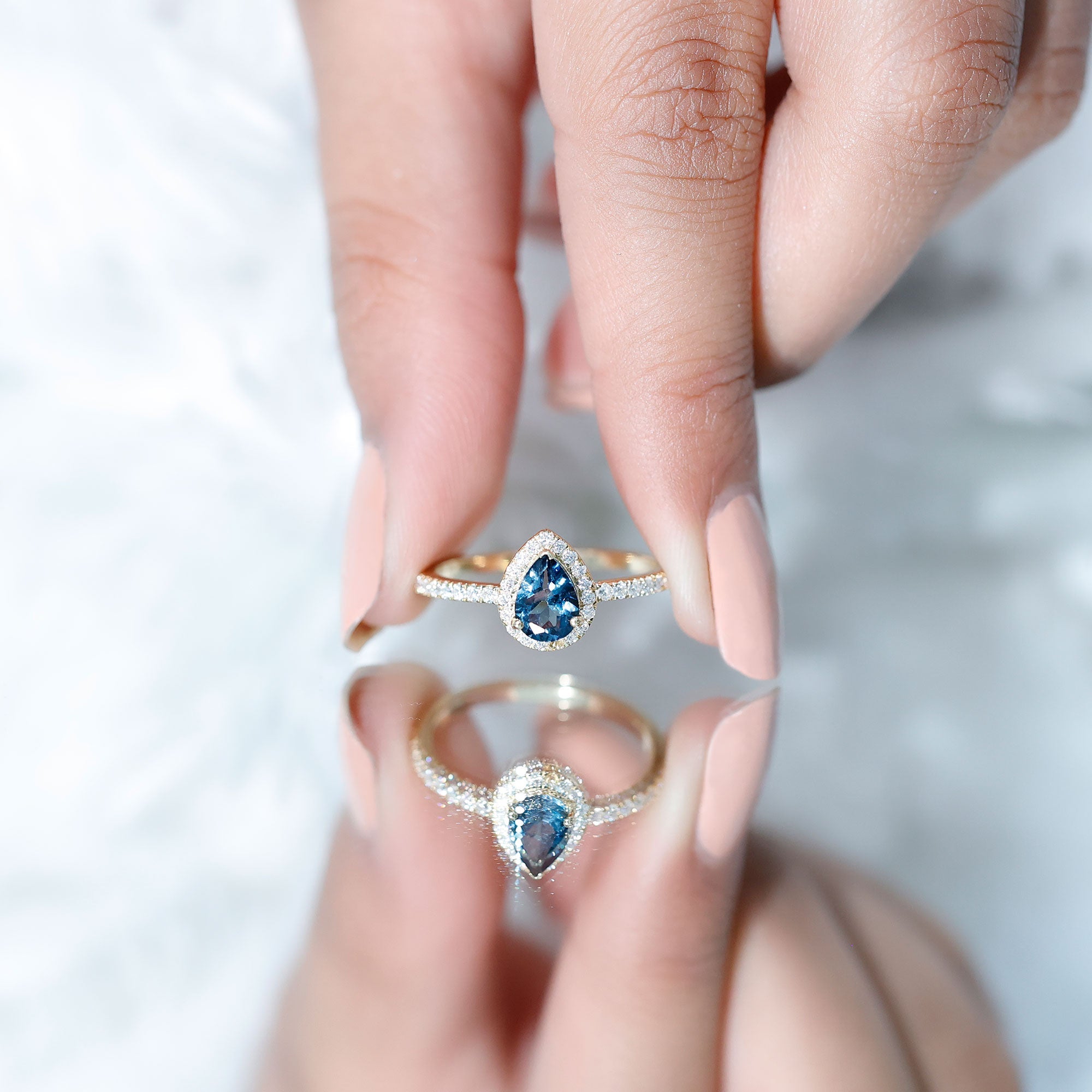 0.7 Carat Pear Shape London Blue Topaz Teardrop Engagement Ring with Moissanite Halo