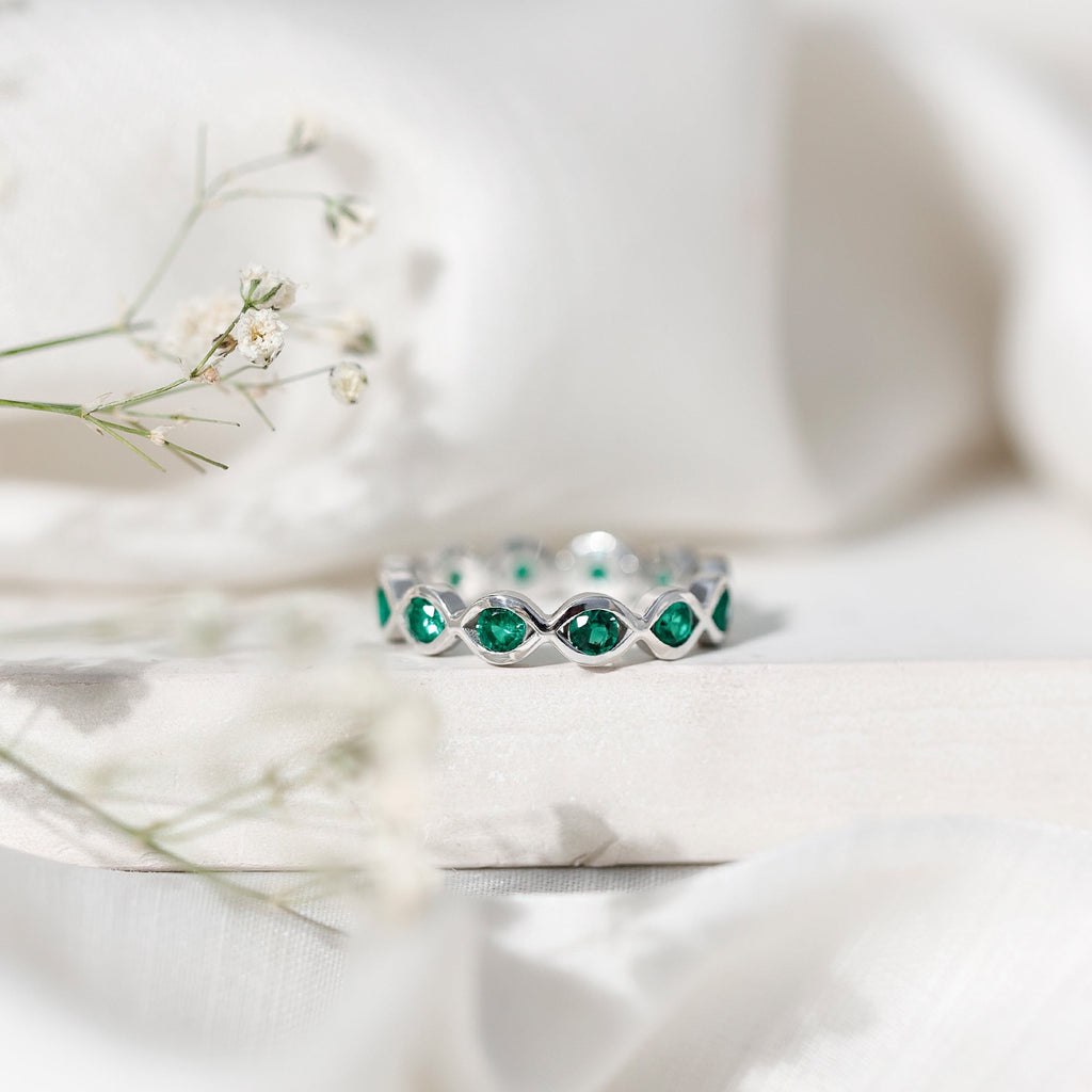 Lab Grown Emerald Ring – Infinity Twist Eternity Band With Brilliant Cut Stones