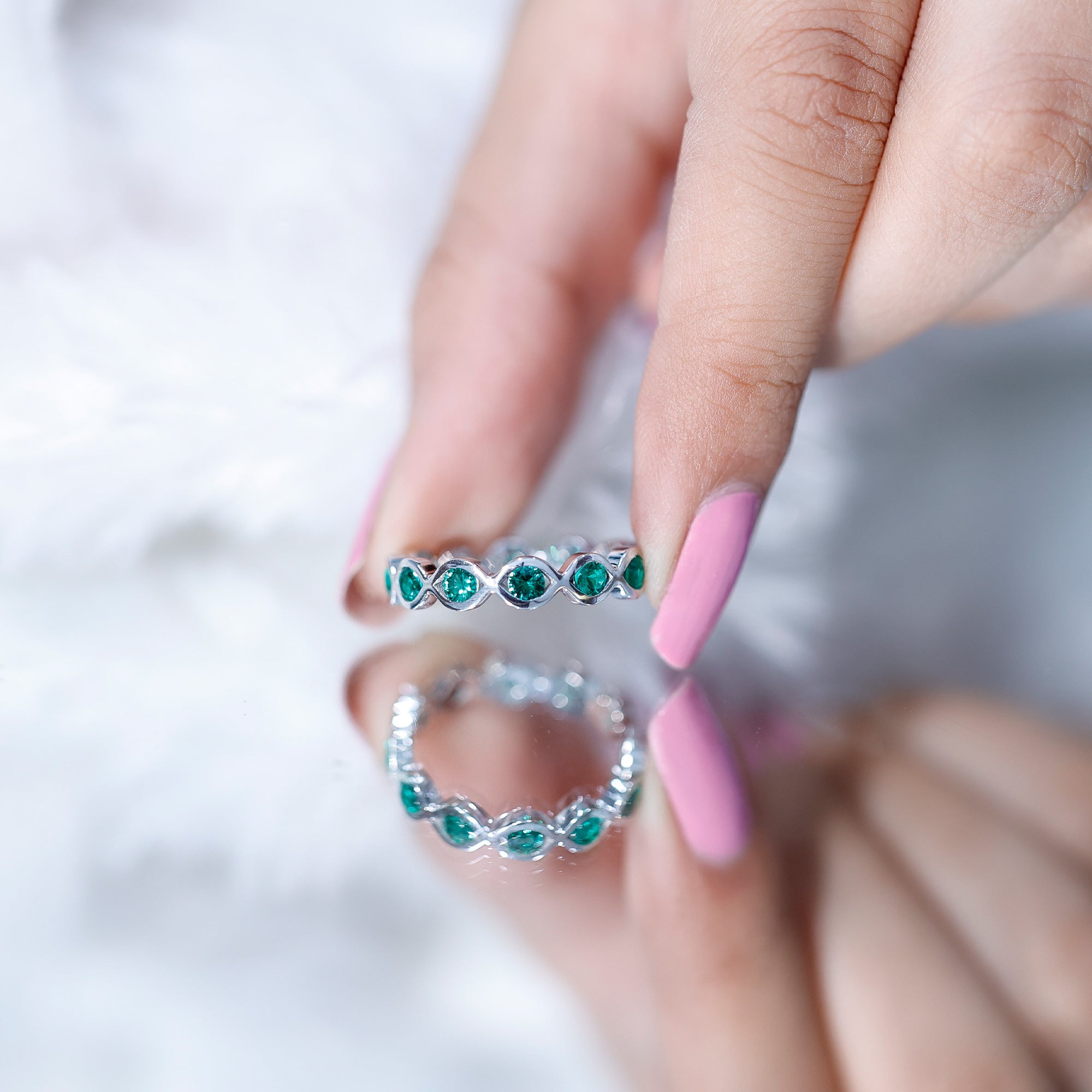 Lab Grown Emerald Ring – Infinity Twist Eternity Band With Brilliant Cut Stones
