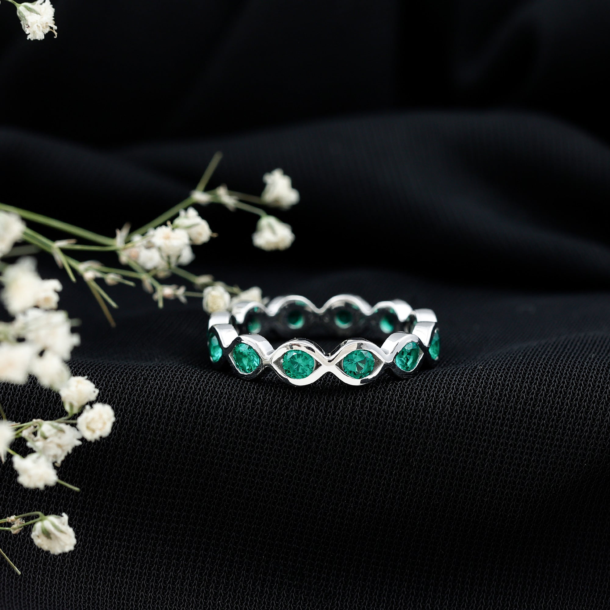 Lab Grown Emerald Ring – Infinity Twist Eternity Band With Brilliant Cut Stones