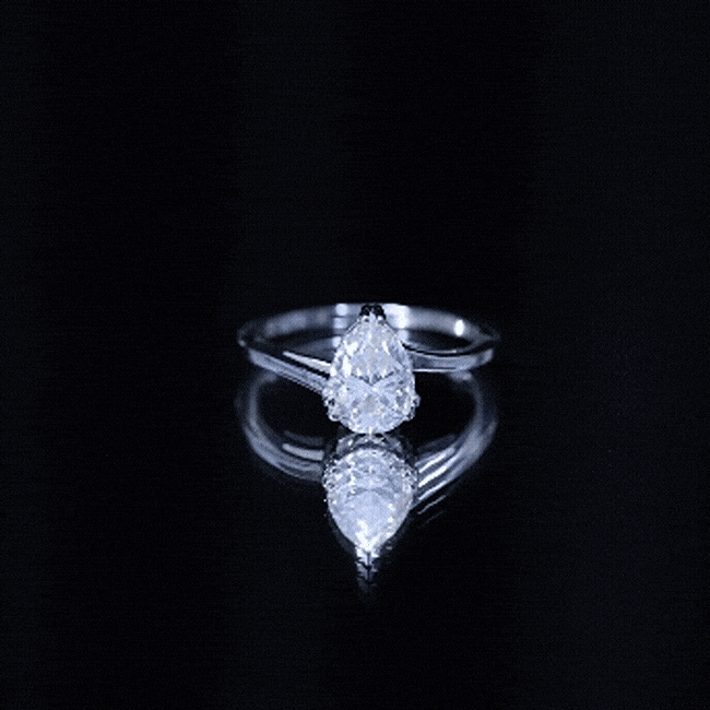Pear Moissanite Ring – 2 Carat Solitaire Engagement With Bypass Design Elegance