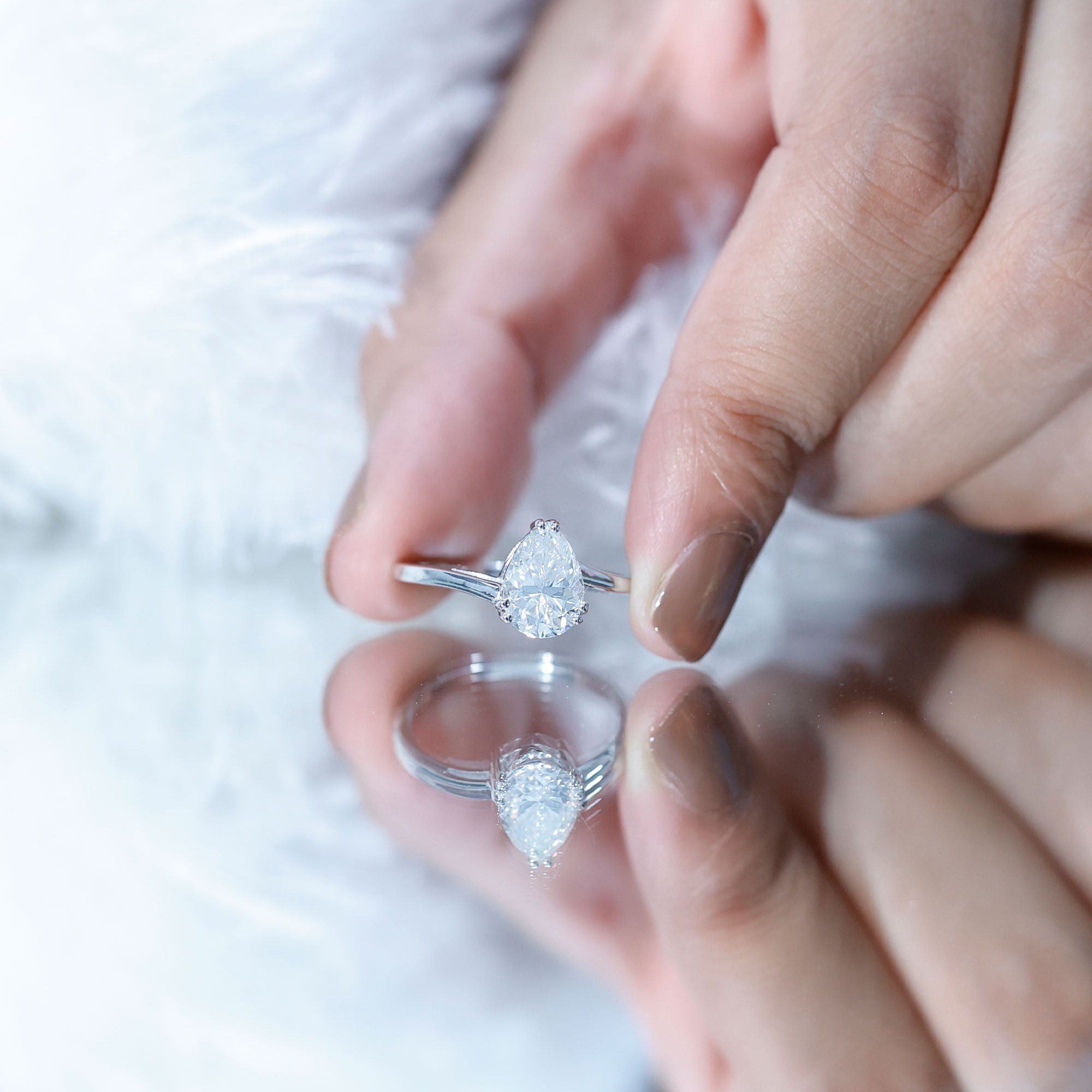 Pear Moissanite Ring – 2 Carat Solitaire Engagement With Bypass Design Elegance