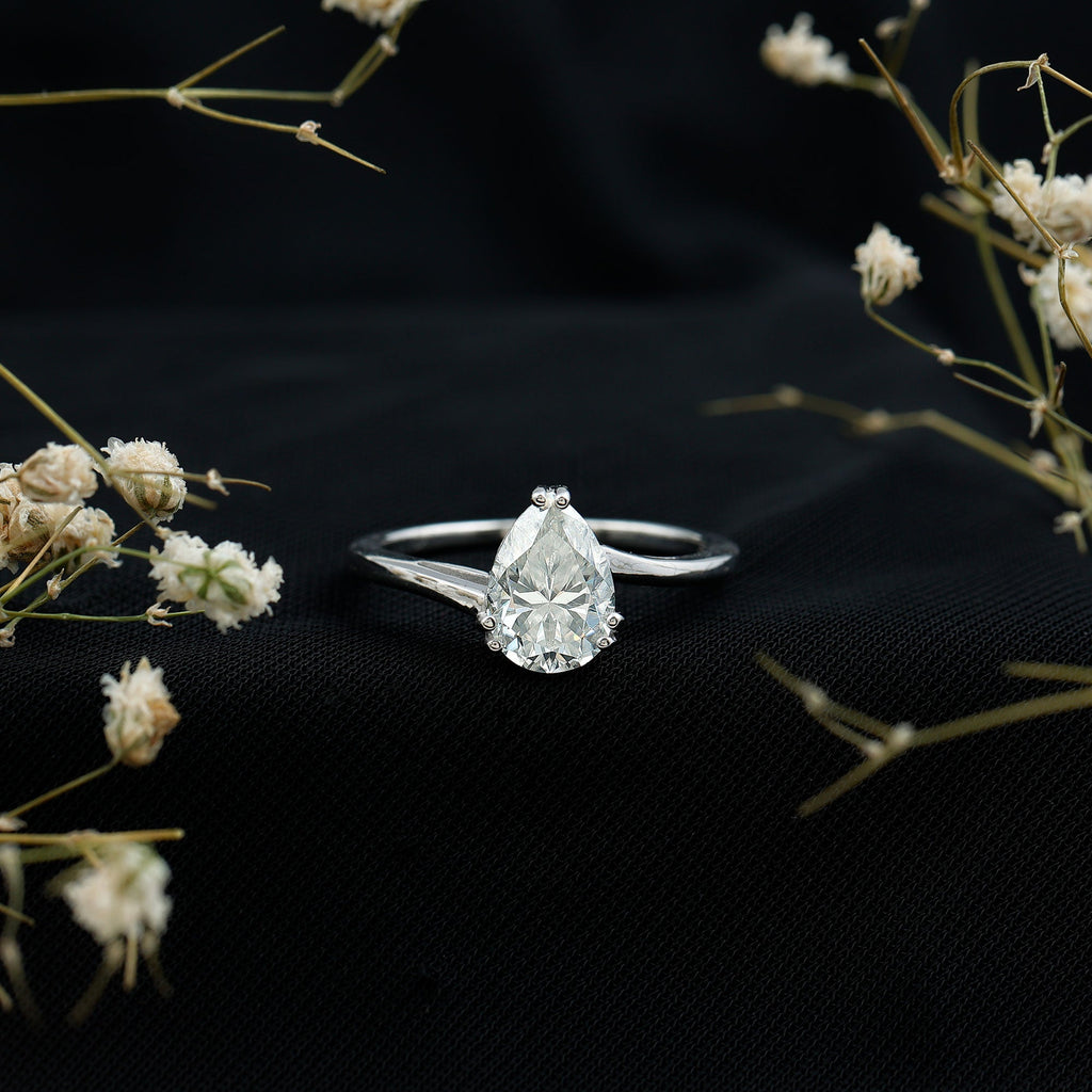 Pear Moissanite Ring – 2 Carat Solitaire Engagement With Bypass Design Elegance