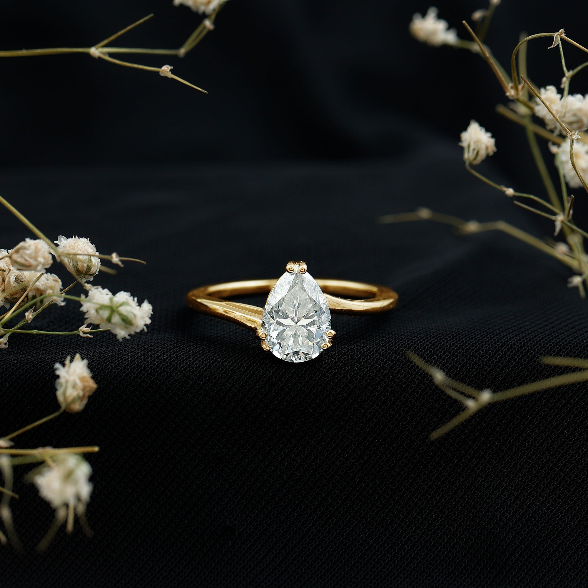 Pear Moissanite Ring – 2 Carat Solitaire Engagement With Bypass Design Elegance