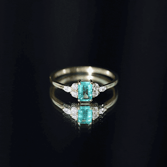 Emerald Engagement Ring | Unique Emerald Cut Ring with Diamond Trio & Balanced Gemstone Design