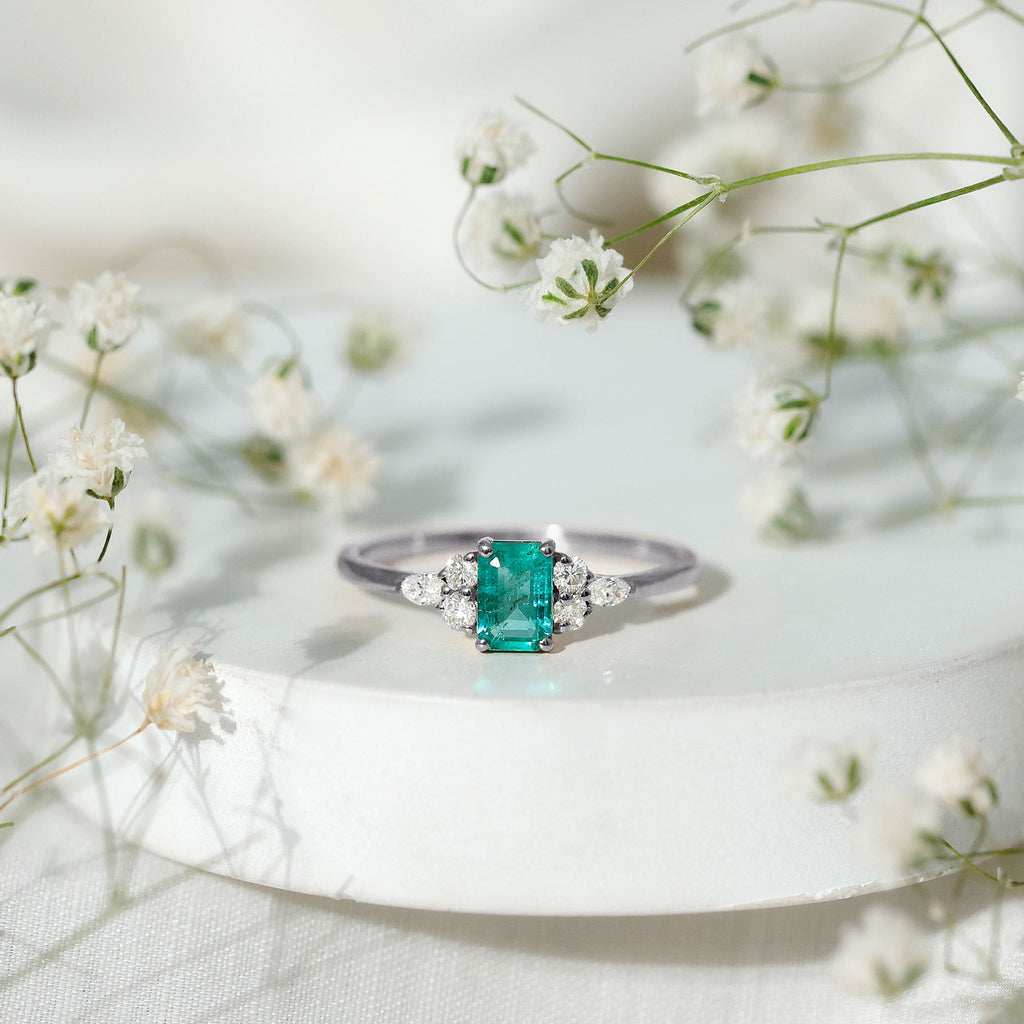 Emerald Engagement Ring | Unique Emerald Cut Ring with Diamond Trio & Balanced Gemstone Design