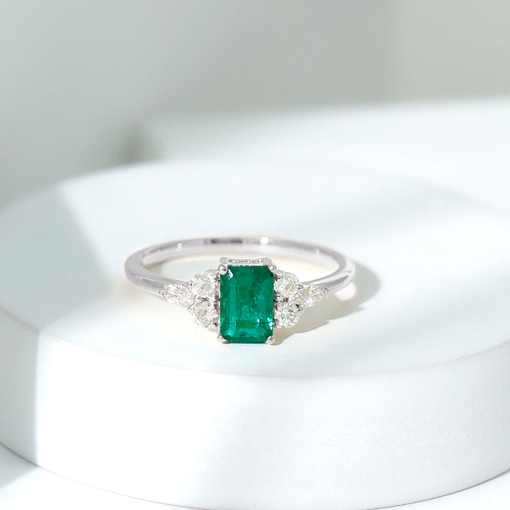 Emerald Engagement Ring | Unique Emerald Cut Ring with Diamond Trio & Balanced Gemstone Design