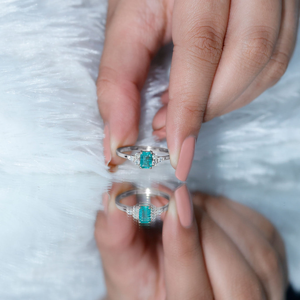 Emerald Engagement Ring | Unique Emerald Cut Ring with Diamond Trio & Balanced Gemstone Design