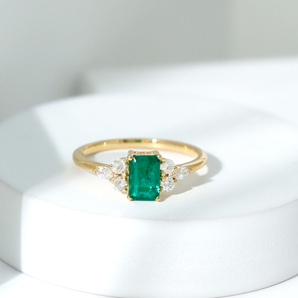 Emerald Engagement Ring | Unique Emerald Cut Ring with Diamond Trio & Balanced Gemstone Design