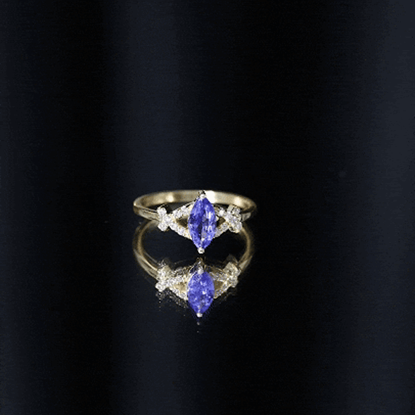 Marquise Tanzanite Ring – Elegant Blue Gemstone With Diamond Promise Band