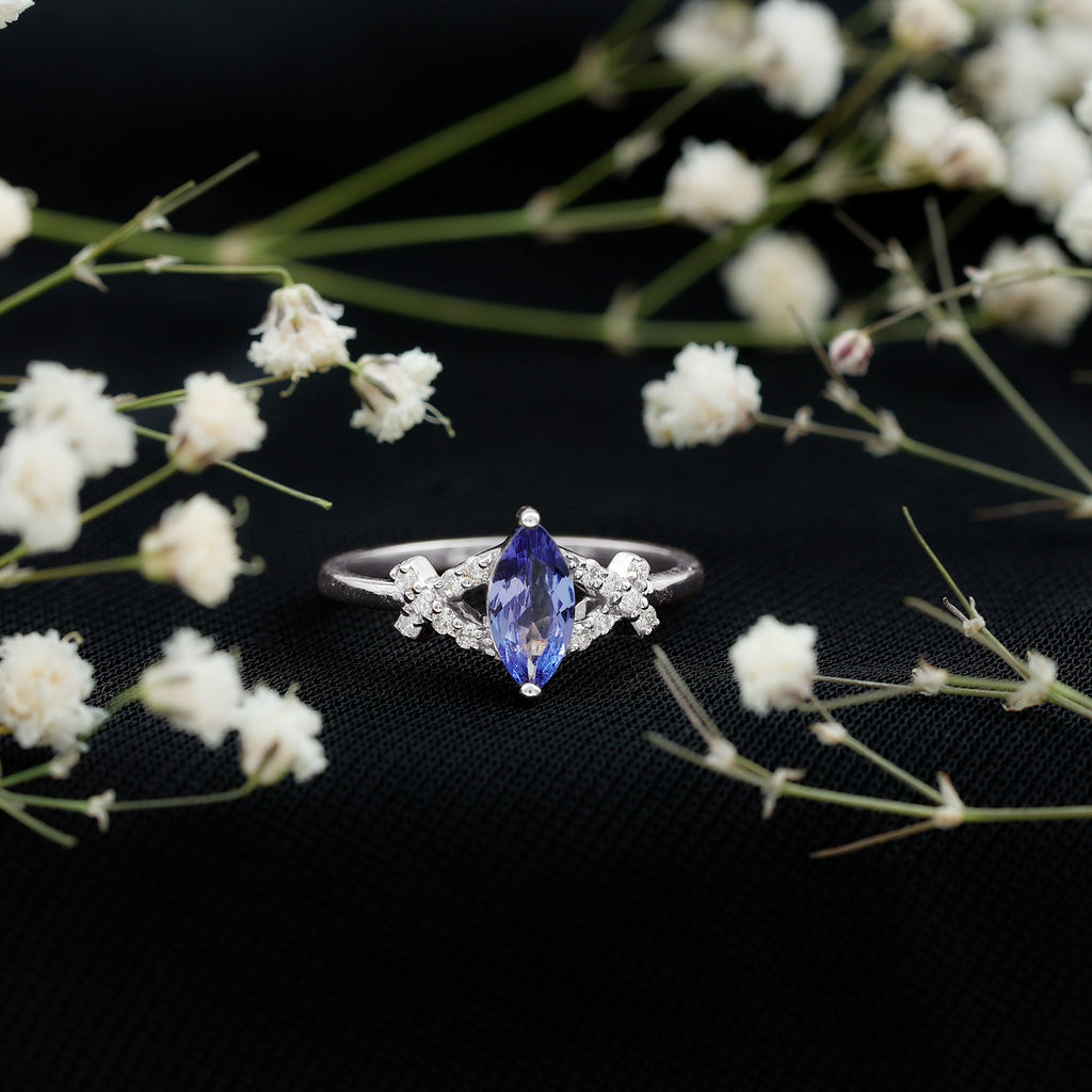 Marquise Tanzanite Ring – Elegant Blue Gemstone With Diamond Promise Band