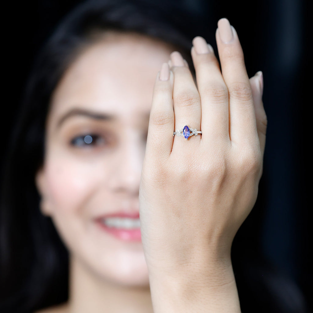Marquise Tanzanite Ring – Elegant Blue Gemstone With Diamond Promise Band