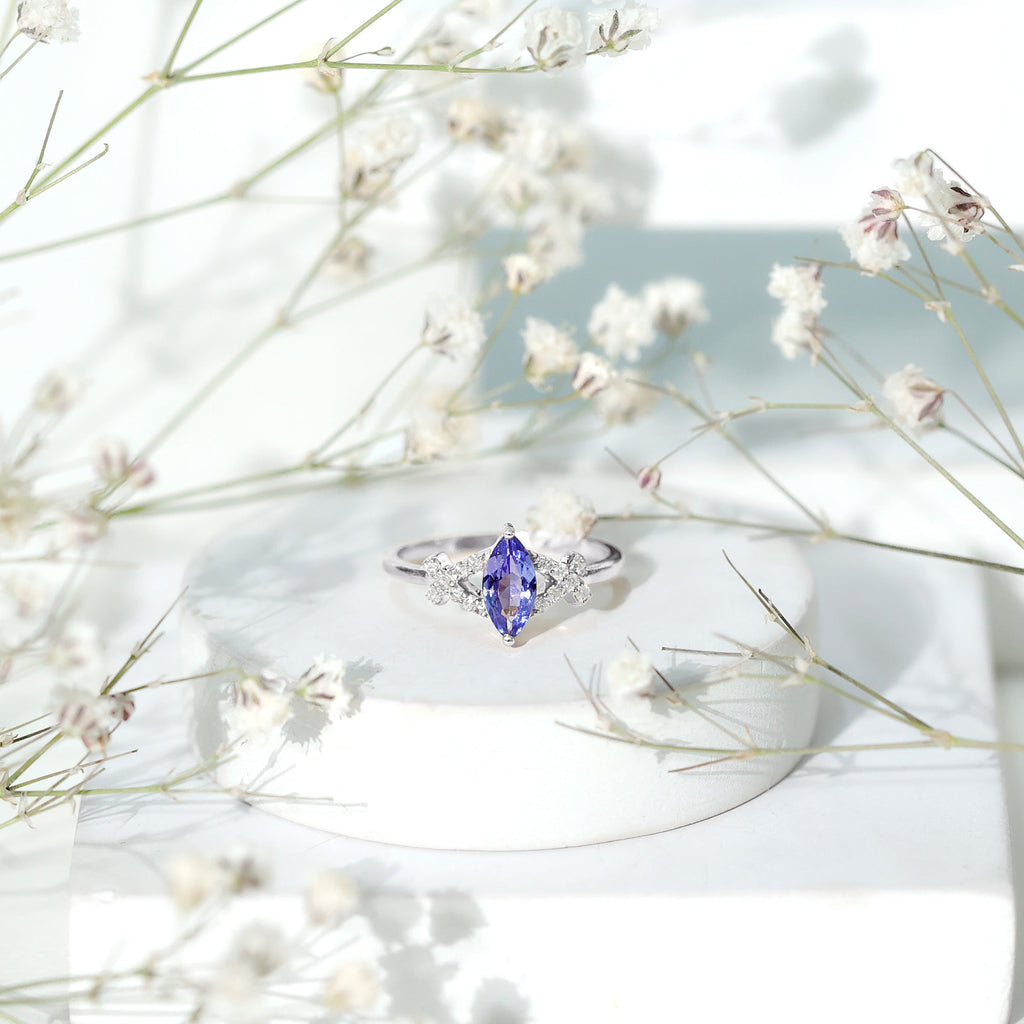 Marquise Tanzanite Ring – Elegant Blue Gemstone With Diamond Promise Band