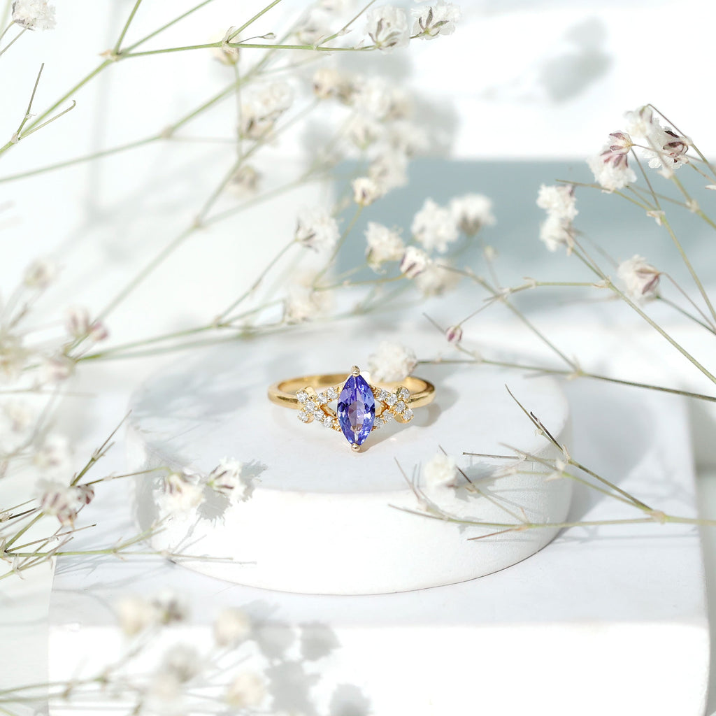 Marquise Tanzanite Ring – Elegant Blue Gemstone With Diamond Promise Band