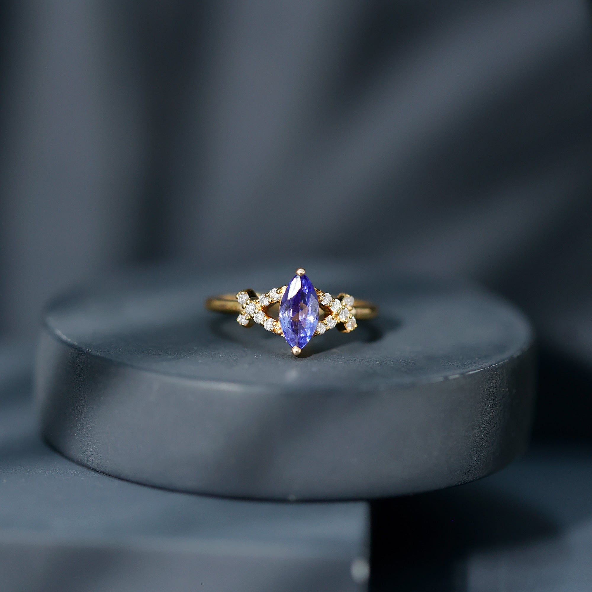 Marquise Tanzanite Ring – Elegant Blue Gemstone With Diamond Promise Band